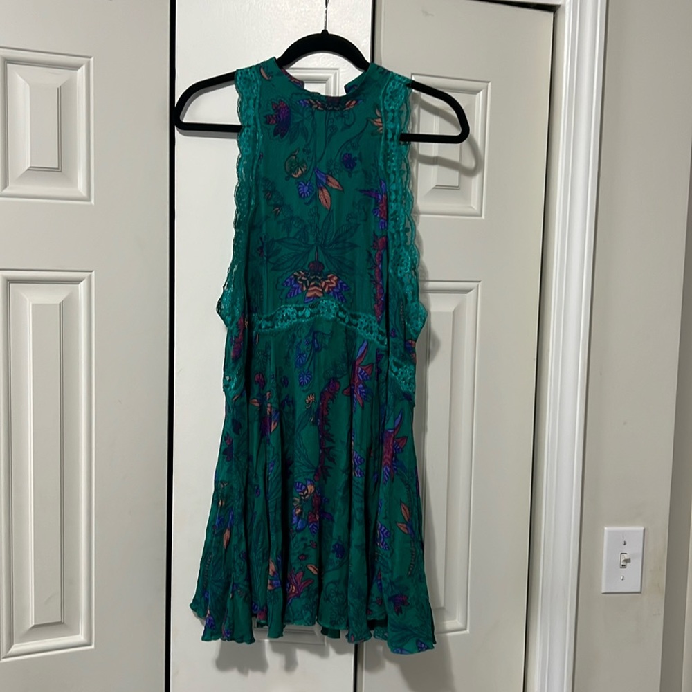 Stunning jewel-toned tunic with open tie back